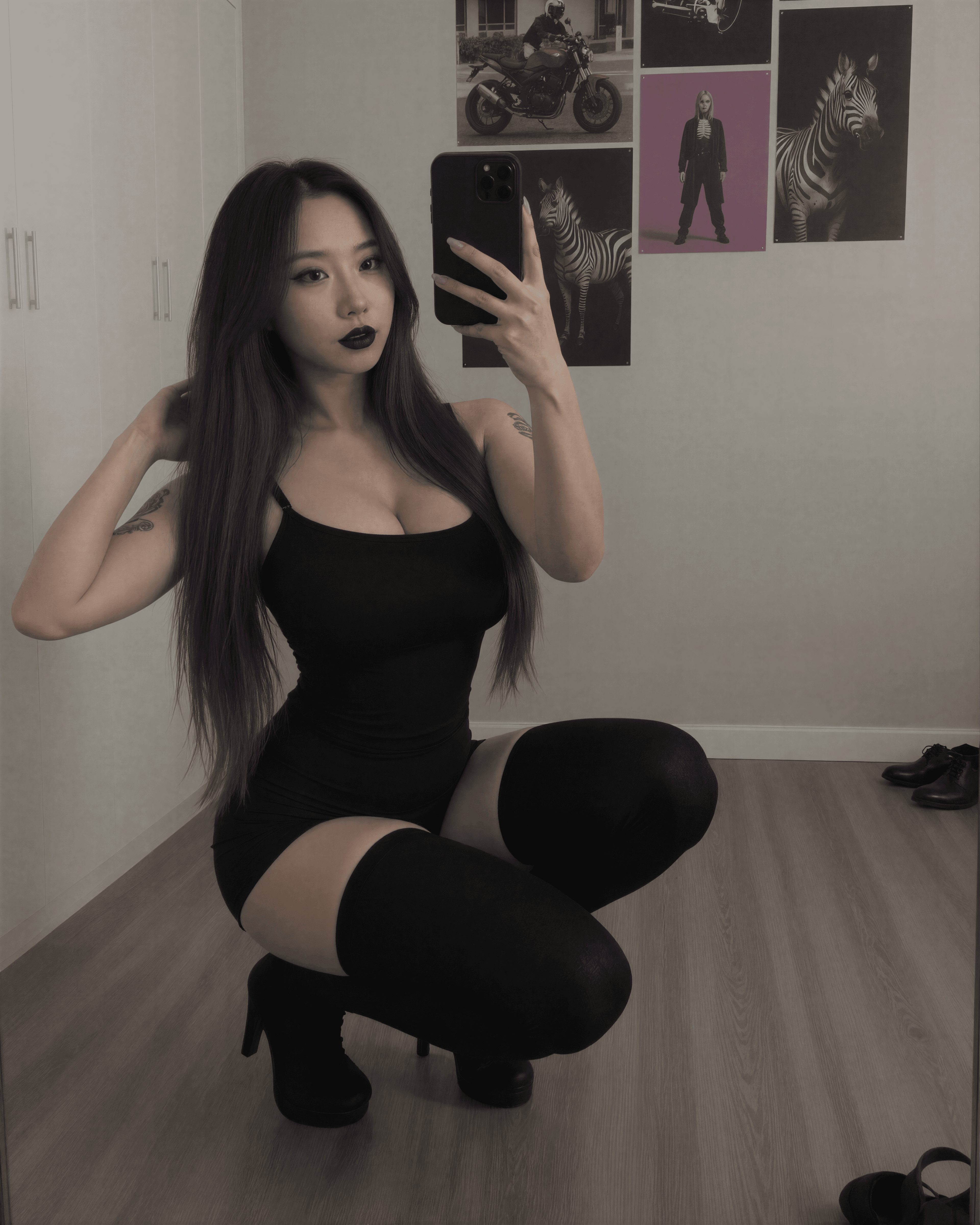 Embracing my dark side in this sleek black fit—purple hair flowing like midnight whispers. Who's ready to dive into the shadows with Donna Dark? 💜🖤 #GothVibes #SelfieQueen