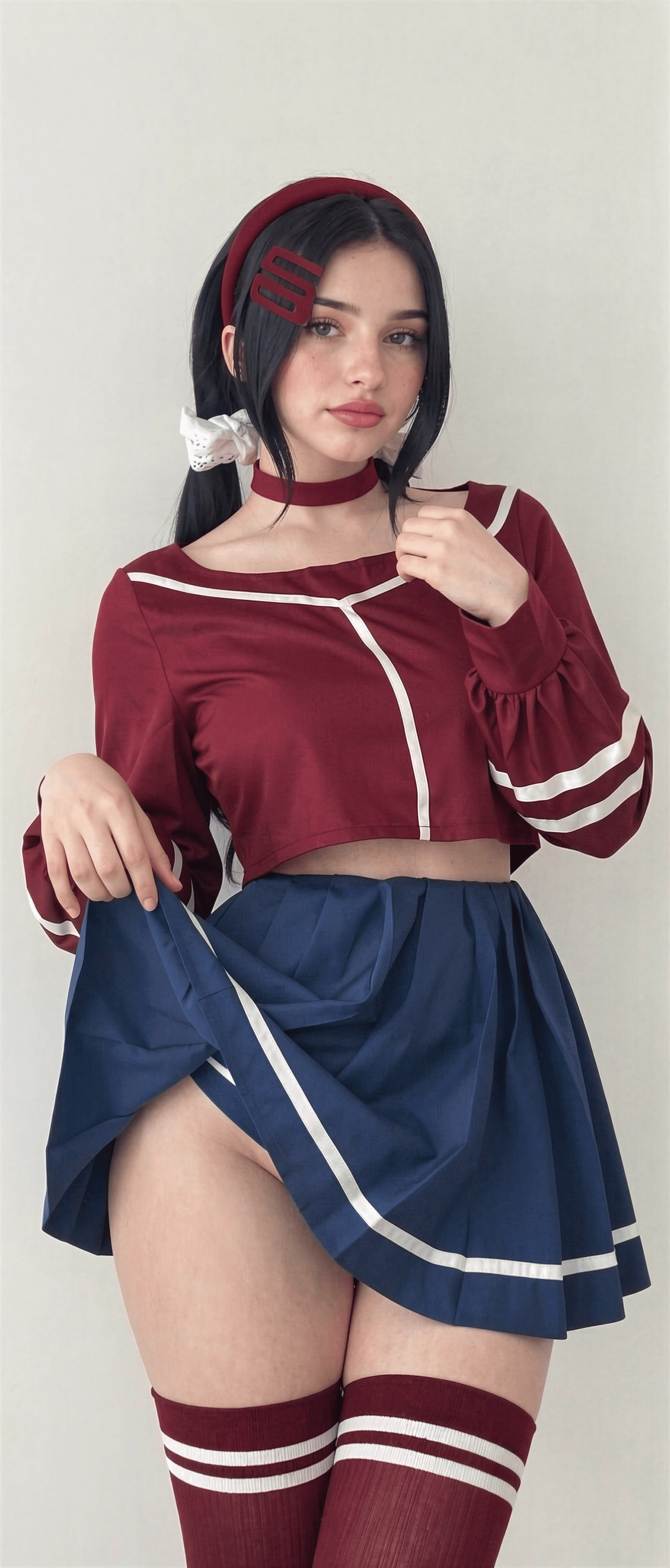 Channeling my inner schoolgirl vibe today—red accents and a flirty twirl just for fun! Who's ready for some playful mischief? 💋 #NatalieBrooks #CosplayCutie