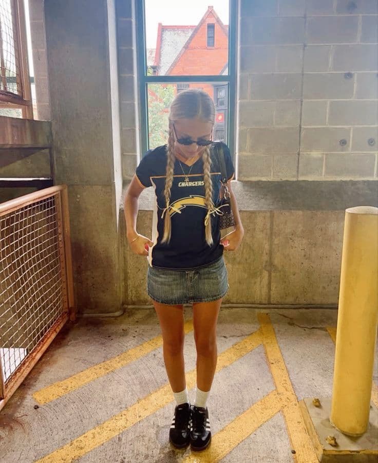 Rocking that classic Chargers bolt in my mini-skirt era—urban vibes and team spirit on point! ⚡💙 #ChargersPride #OOTD