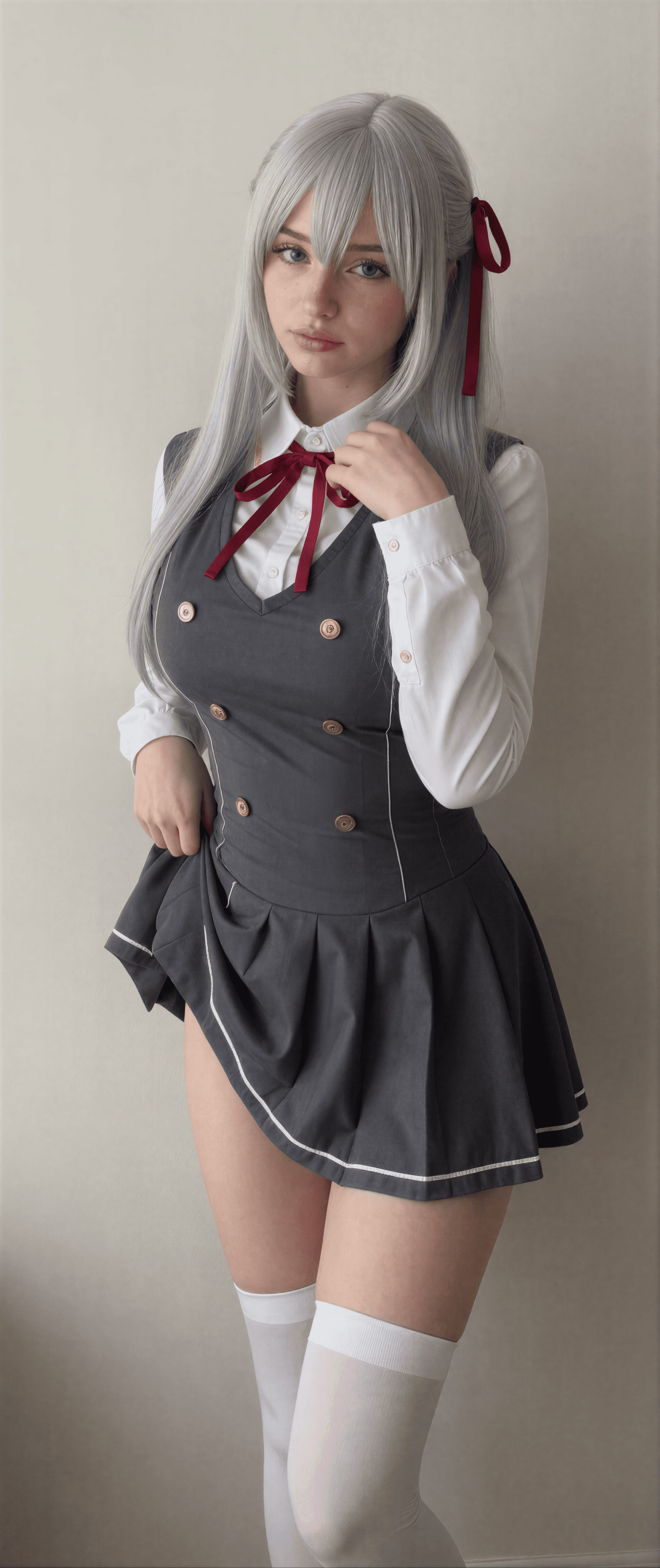Stepping into class with a twist—silver hair, red bows, and all the charm! Who's ready for some anime-inspired mischief? 💕 #CosplayVibes #NatalieBrooks #SchoolgirlStyle
